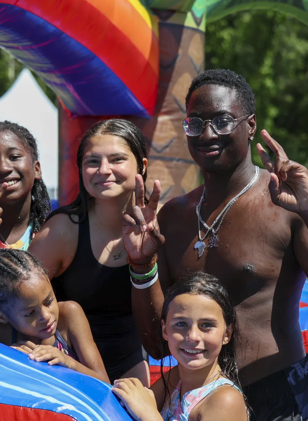 Counselors and campers smiling