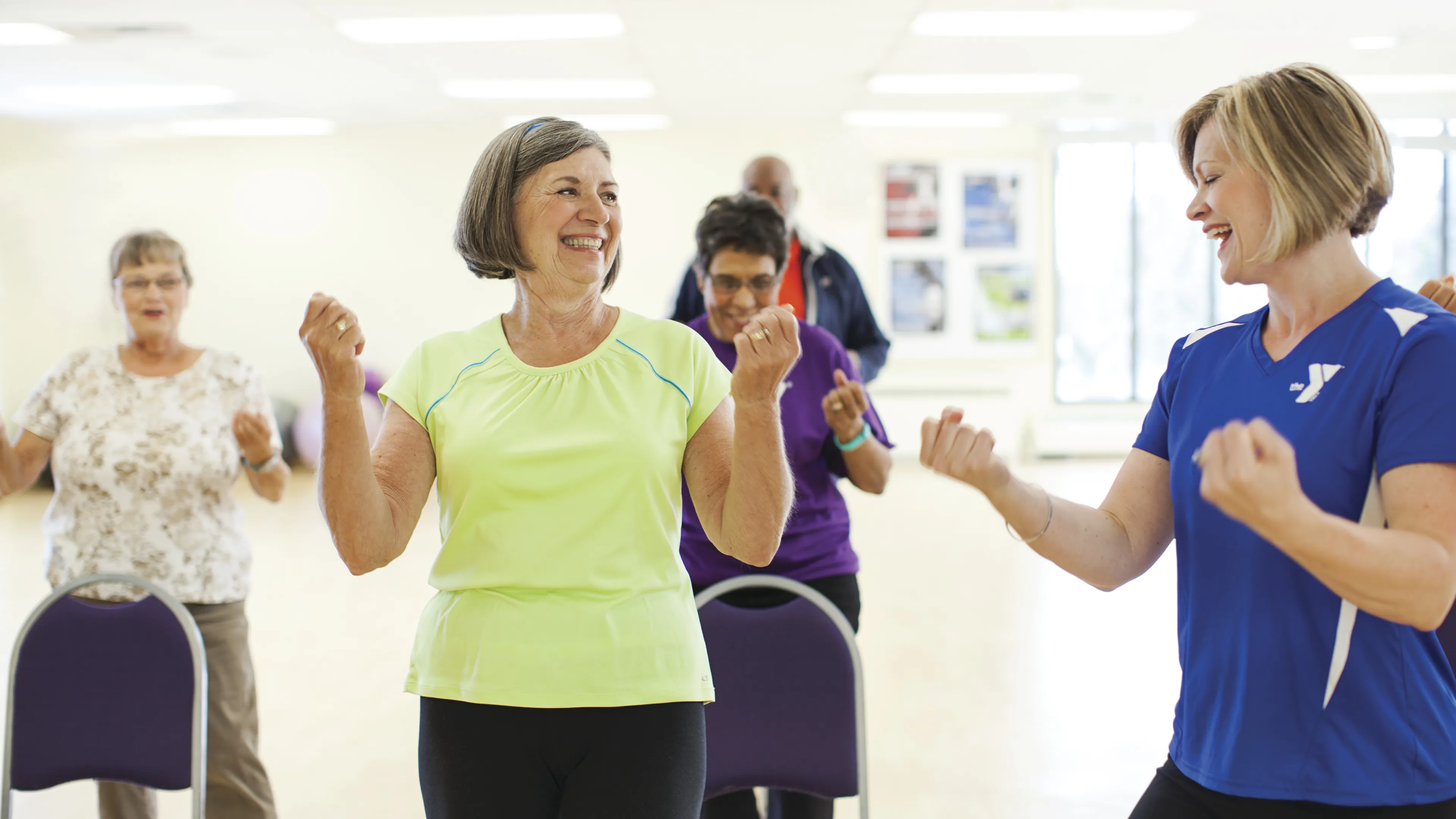 Seniors taking a Group Exercise class