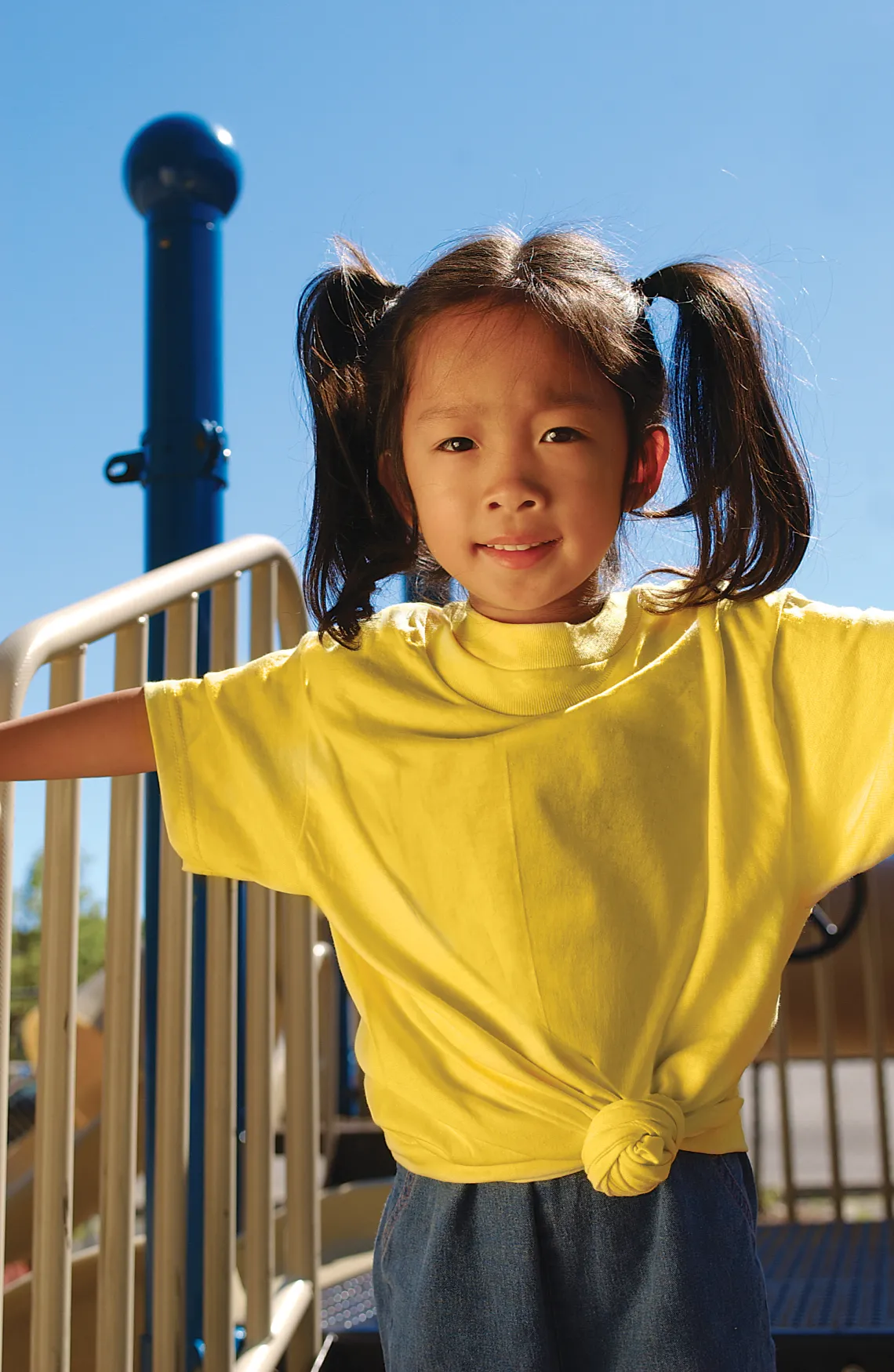 Girl playing on a playground