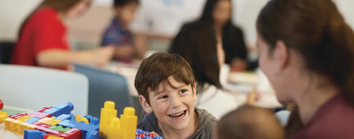 Boy playing with legos